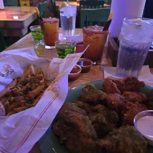 Loaded fries, boneless wings, diablito, and jolly rancher shots.
