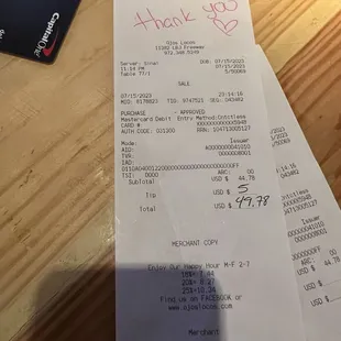 a receipt and a credit card