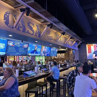 people sitting at the bar