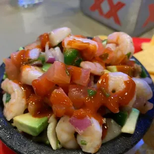 Ceviche with Mexican hot sauce and fresh lime squeezed over the top.
