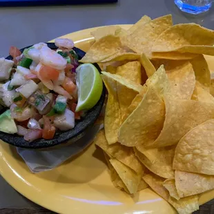 Ceviche service with warm corn chips and salsa