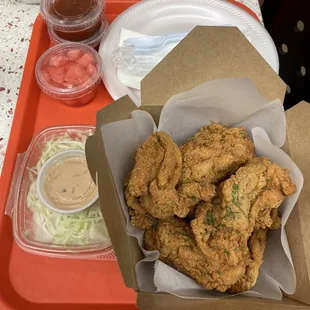 Regular sized fried chicken thigh pieces