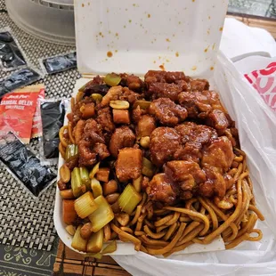 Combo plate with Chow Mein, kung Pao chicken and orange chicken