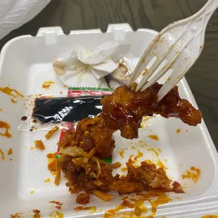 Orange chicken so hard a fork can't even pentrate it and other pieces was legit sand inside because it was so overcooked