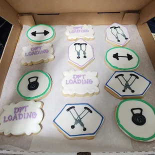 Custom Cookies (purple, green, and blue, physical therapy themed cookies (asked for walkers and weights))