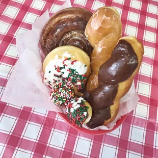 a variety of donuts in a basket