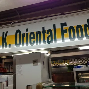 a sign above the counter