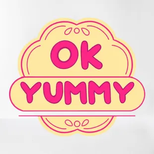 the word ok yummy on a sticker