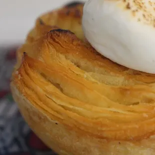 S&apos;mores Danish which is a Danish with chocolate inside topped with a roasted marshmallow.