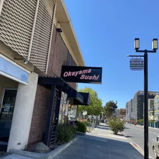 the entrance to okayama sushi