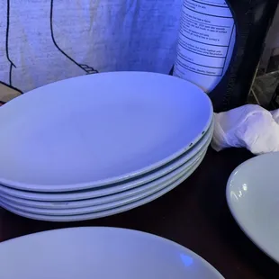 sharing plates at table but not clean