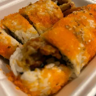 a close up of a sandwich in a styrofoam container