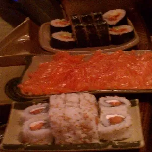 a variety of sushi and rolls