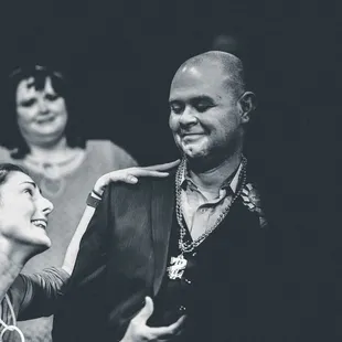 a black and white photo of a man and a woman