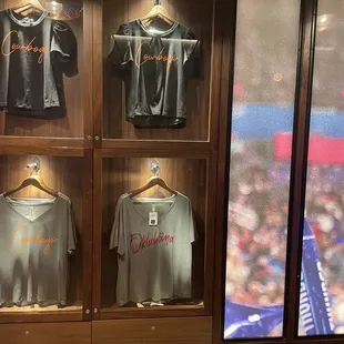 shirts on display in a display case