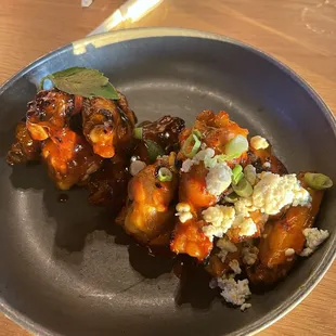 Half Tamarind BBQ and half Red Hot wings. Both great, BBQ was my favorite and the red hot wasn&apos;t very hot