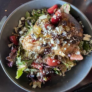 Greens and goat cheese salad with salmon added