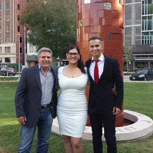 OKC Wedding Officiants John T Snelson V  performing a Justice of the Peace ceremony on the lawn across from Oklahoma City Museum of Art.