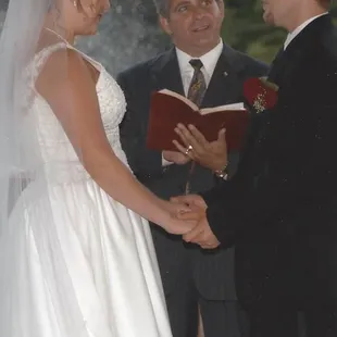 OKC Wedding Officiants Pastor John T Snelson V  performing a wedding ceremony in Edmond.