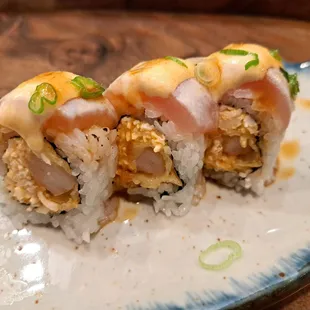 White Dragon roll - spicy crab and deep fried shrimp topped with escolar and albacore