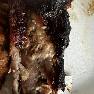One of the extremely burned ribs I bought a half a rack