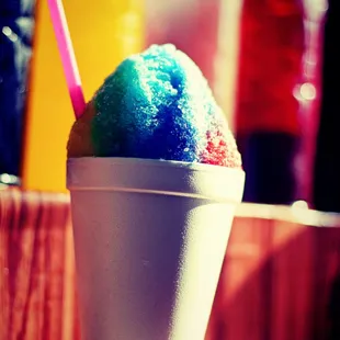 a colorful ice cream in a cup