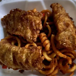 Fish 'n chips, curly fries, coke slaw and tarter sauce.