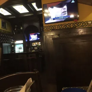 Corner bar, tv, and some decor