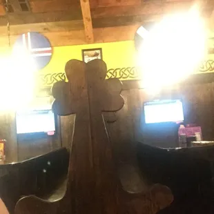 Got some reflection on this picture but each booth has its own tv for you sports fans!