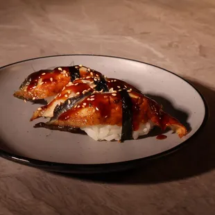 Delicate eel sushi, a flavorful highlight of Japanese cuisine.