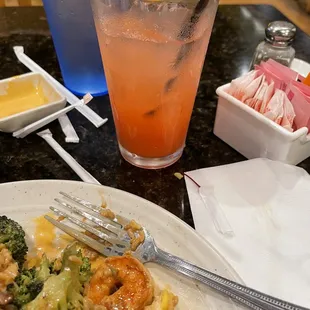 Filet mignon, shrimp and broccoli only with a Tequila Sunrise
