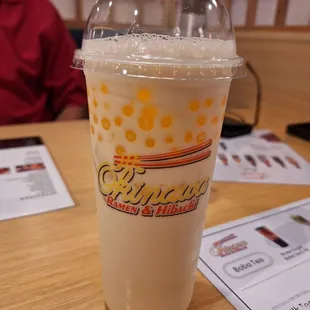 Mango milk tea with mango popping boba was super delicious!!