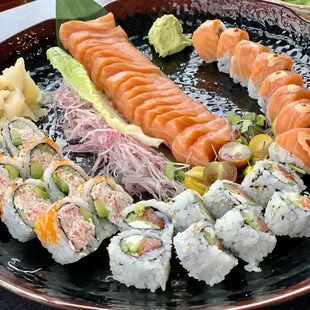 various types of sushi on a plate