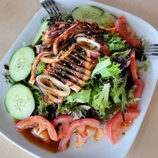 A happy grilled squid salad. Well the squid isn't happy but it's sacrifice ensured my survival for another day. Blessed.