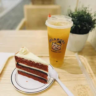 a slice of cake and a drink