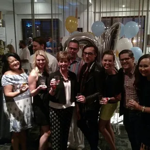 a group of people posing for a picture