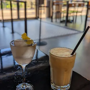 two cocktails on a table