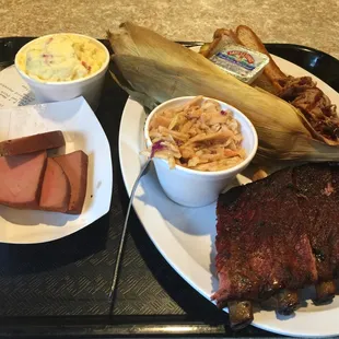 Ribs, Bologna and pulled pork served with corn on the cob, spicy coleslaw and potato salad!