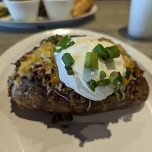 Wednesday Special: BBQ Baked Potato, $11.99 prior to tax (normally $13.99) + $1 brisket