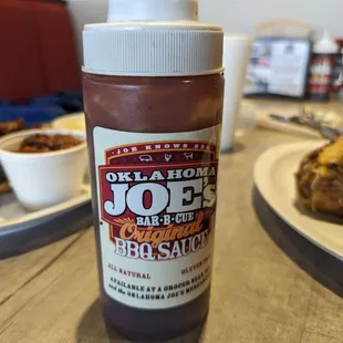 a bottle of barbecue sauce on a table