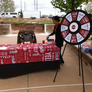 Stop by the Yelp booth and spin the Wheel of Yelp