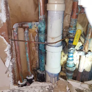 Water leak under the sink (in the wall)