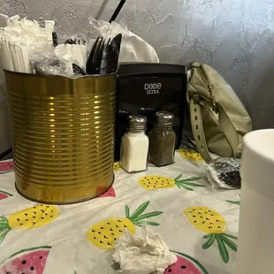 On the tables .. plasticware etc..