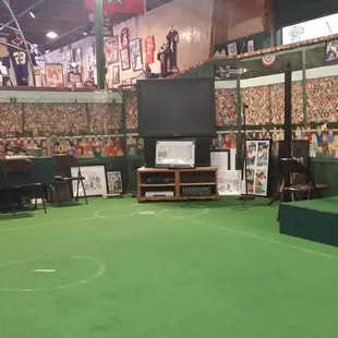 There is an area for gatherings that is designed like a baseball field.