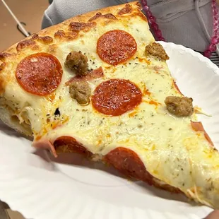 Double pizza slice -- one on top of the other..lotsa yummy stretchy mozz, just ok bready crust..but we liked it.