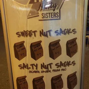 A vendor selling sacks of sweet or savory nuts