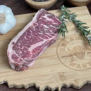 a piece of steak on a cutting board