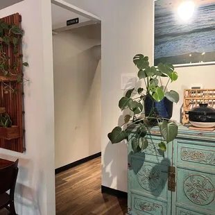 a dining room with a table and chairs