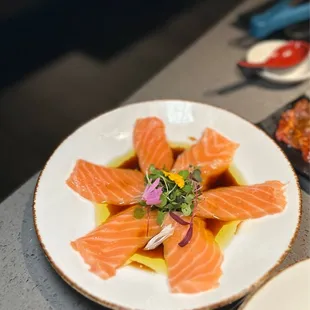 Each sashimi slice in the salmon carpaccio was so thick and tender!