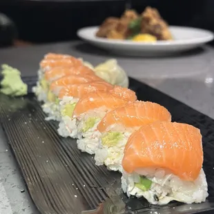 Truffle salmon roll with thick cuts of sashimi